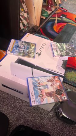 Brand new never open PS5 and three games