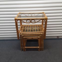 4 PIECE SET OF WICKER  NESTING TABLES VERY GOOD CONDITION 