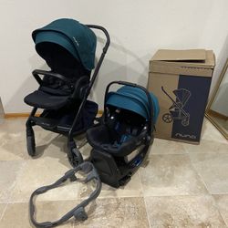 Nuna Mixx Next Stroller With Car Seat With Green Canopy