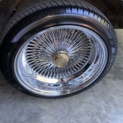 17x7 reverse/deep dish 100 spoke wires with tires.