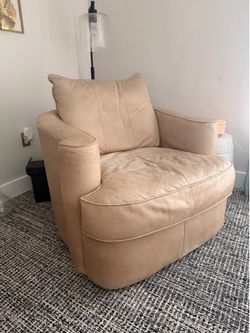 2 Beige swivel chairs
