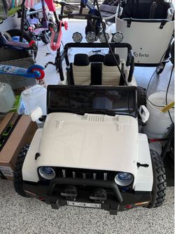 24V two-seat Jeep-style ride-on with remote