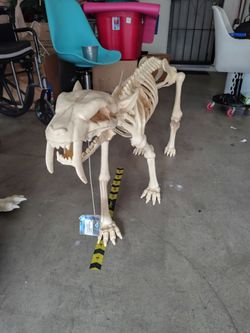 Animated Saber-Tooth Skeleton Halloween Prop