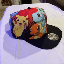 **NEW**  Pokemon hot topic hat with coin and 10 holo reverse cards set.
