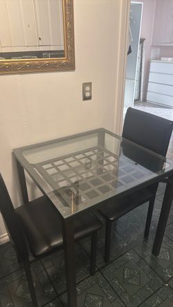 Dining table with two chairs