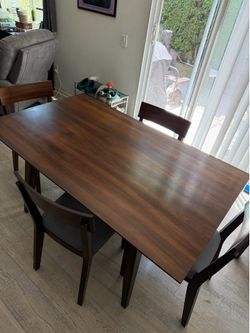 Wooden table + 4 chairs
