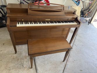 Holland upright Piano by Baldwin