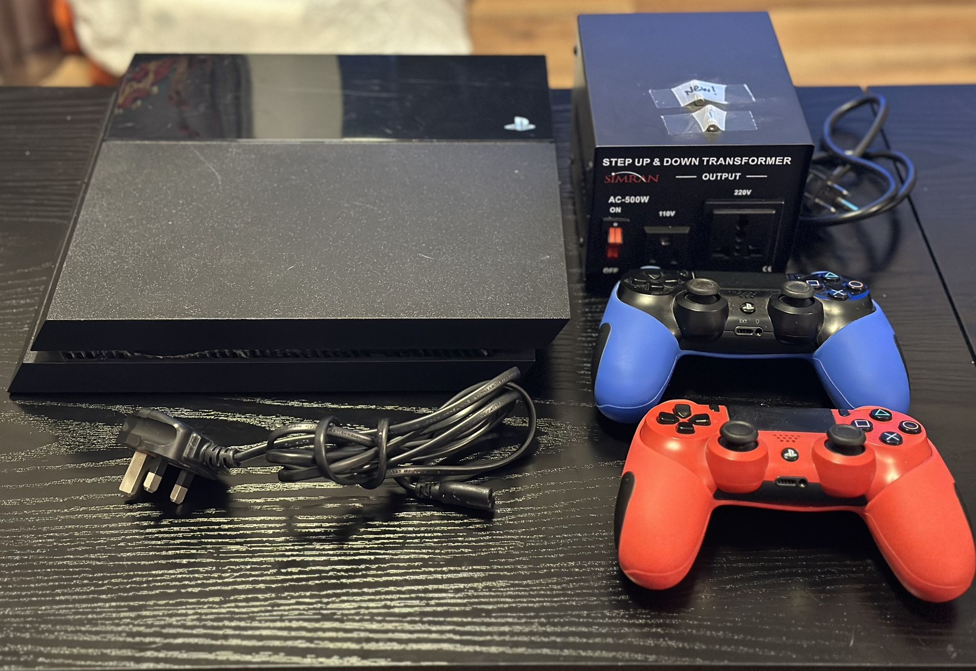 PS4 with Controllers + Voltage Converter