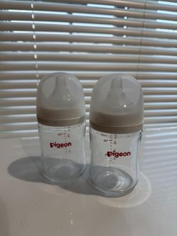 Pigeon glass bottles