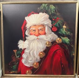 Large framed painting of Santa Claus with Christmas tree.