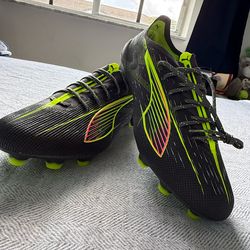 Puma black and neon 10.5 US
