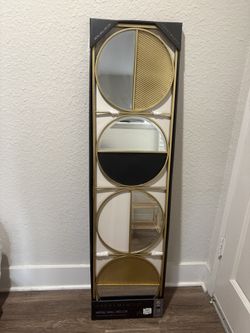 Metal wall decor with mirrors