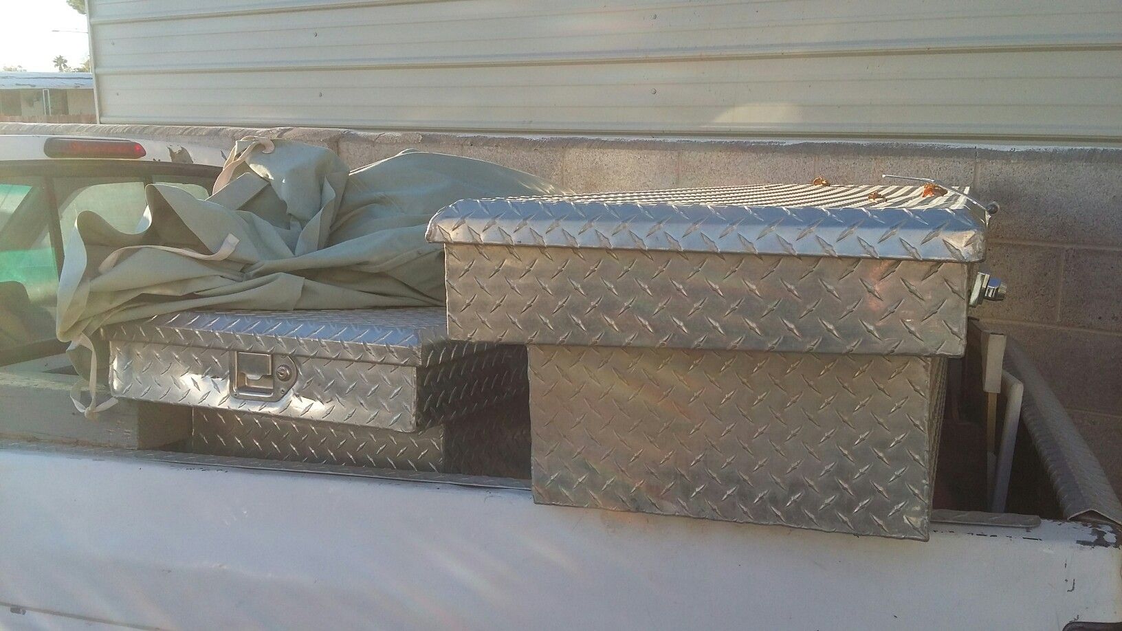 Diamond plate tool boxes one of them fits full-size trucks and the other one it's smaller trucks like S10 or Ford Ranger
