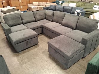 Light gray couch set with pull-out bed and storage