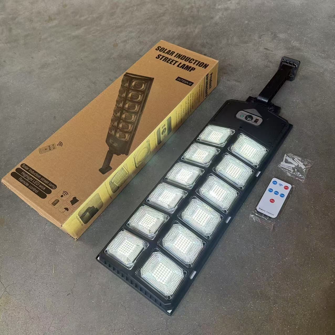 New In Box 24x7 Inch Solar Panel LED Wall Mounted Street Light Motion Sensor Security Lighting With Remote Controller 