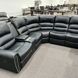 New Reclining Sectional .  Black Leather .  111” X 98”.  Free Delivery !
