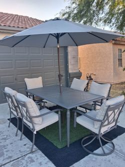 Patio Set All New Table and 6 Chairs With New Cushions And New Umbrella