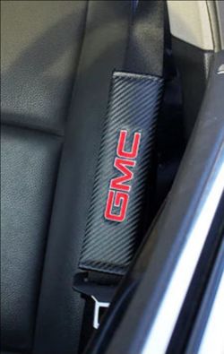 2 GMC universal carbon seatbelt shoulder pads covers. Other items sold separate SHIPPING AVAILABLE