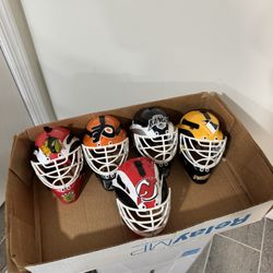 Early 2000s NHL Riddel Goalie Helmets