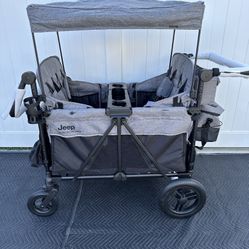 Jeep Wrangler Deluxe 4 Seater Stroller Wagon/ Jeep/ Wagon/ Stroller/ Baby/  Kids for Sale in Buena Park, CA - OfferUp