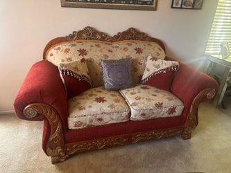 Victorian-style carved wood loveseat, sofa and dining table set