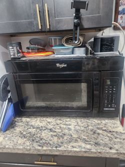 Black whirlpool over the range microwave