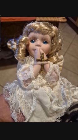 New Porcilian Praying Doll