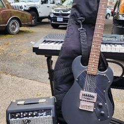 Electric Guitar + Amplifier 