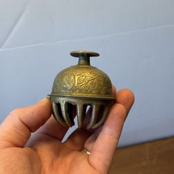 vintage brass elephant claw bell 
