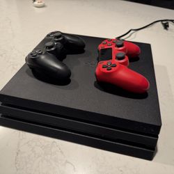 PS4 Pro & 2 DualShock Controllers