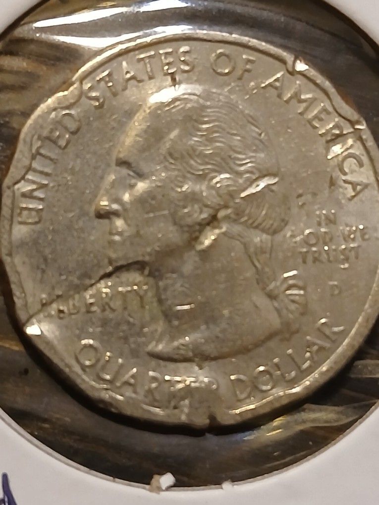 1999D Quarter With Strange Mint Damage