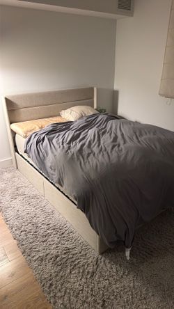 Queen bed with mattress and storage