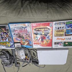 Nintendo Wii With Four Games 