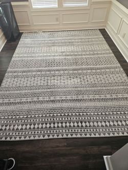 Area rug with 3 matching accent rugs