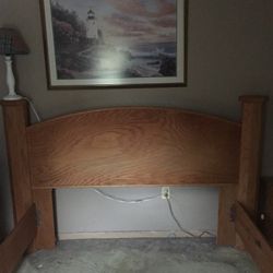 Queen Oak Pedestal Bed.  No Frame Or Mattress