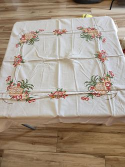 Vintage embroidered tablecloth measuring 45 x 40