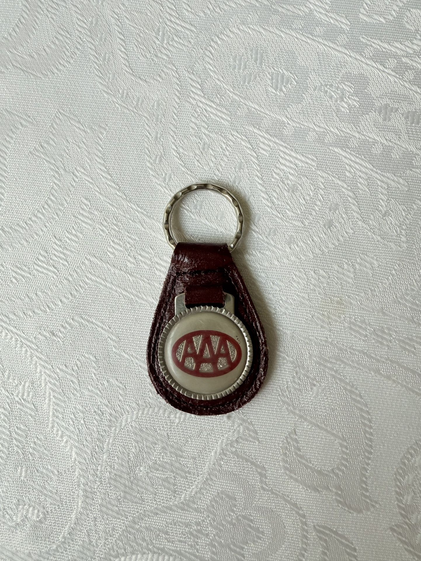 RARE 1950s-60s “AAA” Vintage “REAL LEATHER” PROMO KEY CHAIN. “Proudly Made in The USA”. This vintage AAA keychain is a must-have for any collector or 