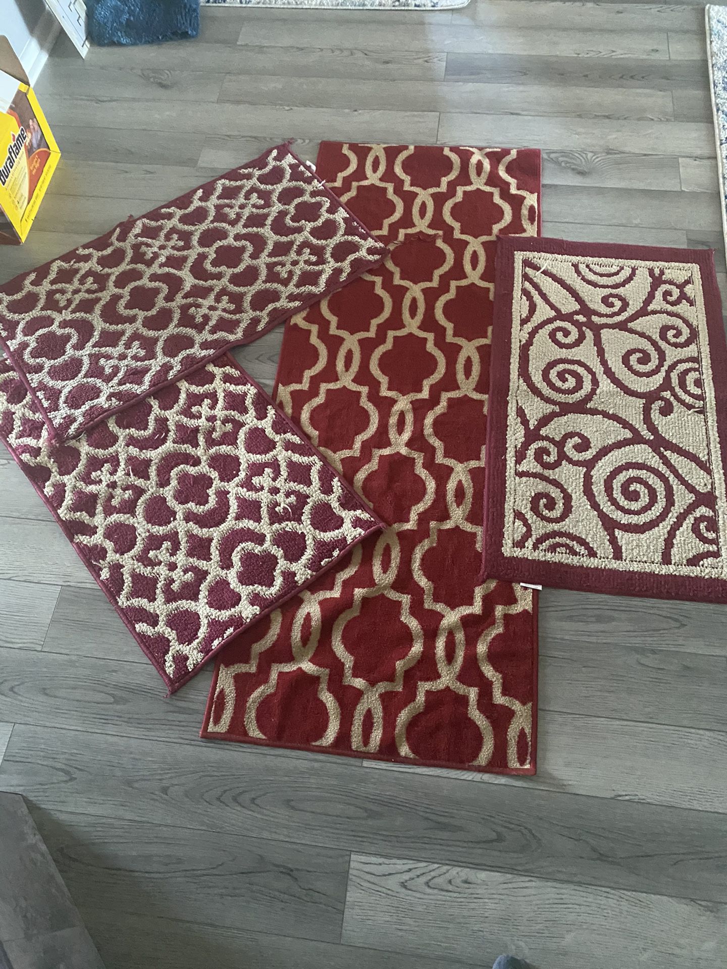 Runner rug and three smaller rugs