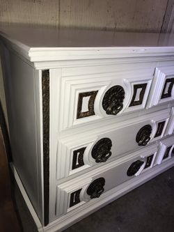Nice white dresser with bronze knobs