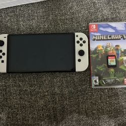 Nintendo Switch OLED With Minecraft And Animal Crossing