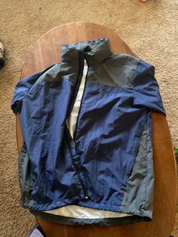 Large frogg toggs waterproof hooded jacket.