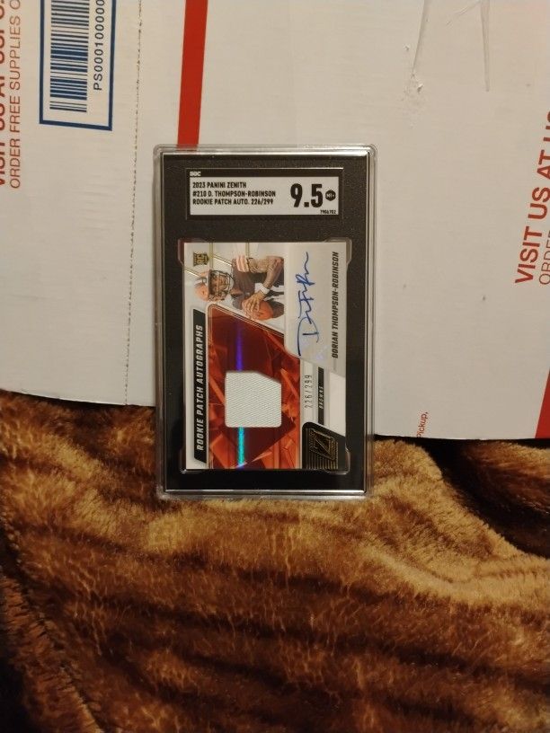 2023  DORIAN THOMPSON ROBINSON  ROOKIE  AUTOGRAPHED PATCH  226/299  SGC  CERTIFIED 9.5