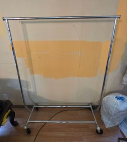 Heavy duty stainless steel commercial grade clothes rack, adjustable, extendable.