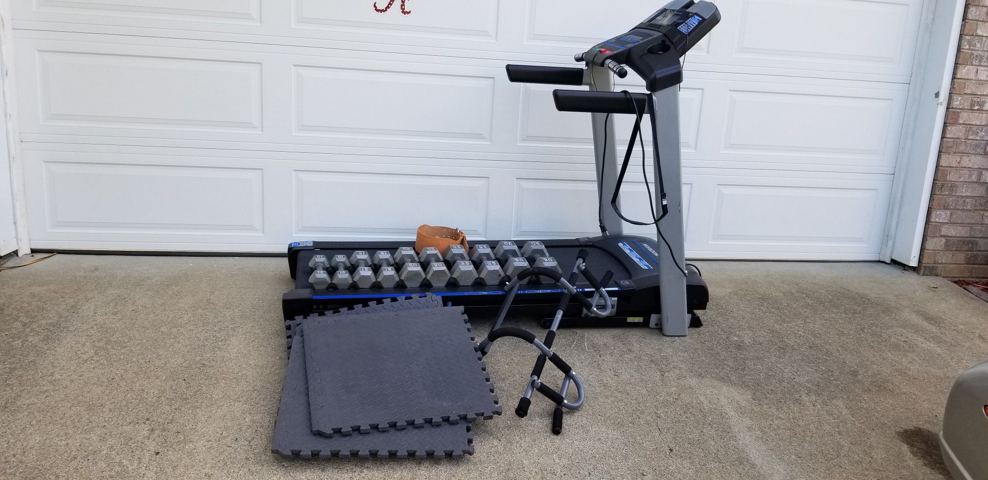 Treadmill and dumbbells