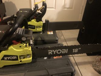 RYOBI 18 INCHES LONG. 38 CC 2 CICLE GAS CHAINSAW BRAND NEW