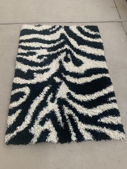 Two small area rugs