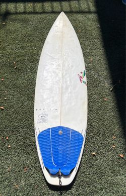 Rusty Mi Amigo 5’10” 27L with a board cover