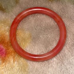 Reddish orange jade bracelet