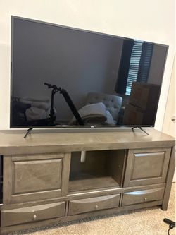 TV (Desk included) Refrigerator, Washing Machine, and Dryer