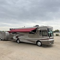 2003 Winnebago Journey 32ft 2 slides Car trailer 17ft